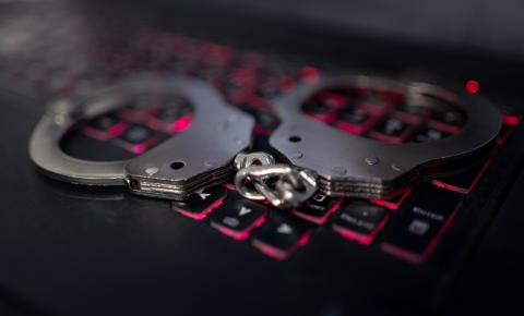 Handcuffs on Keyboard